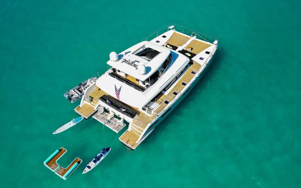 Charter Catamaran ULTRA Accommodates 8 guests in 4 cabins. All Inclusive week charters in the BVI starting at $40,000. Full Crew, Captain & Chef onboard.