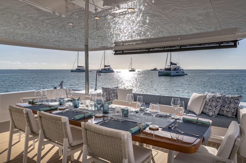 Charter Catamaran OMAKASE Accommodates 6 guests in 3 cabins. All Inclusive week charters in the BVI or Bahamas starting at $42,000. Captain & Chef Onboard.