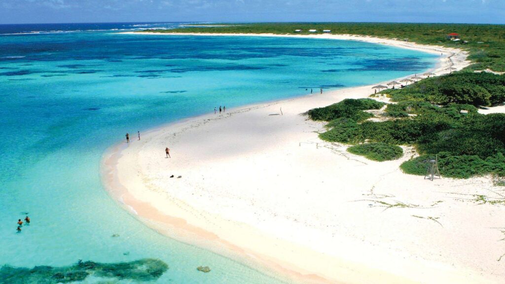 explore the white sandy shores along the coast of the island of anegada during your 6 night charter itinerary through the BVI