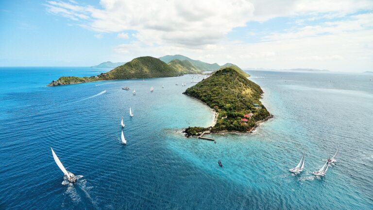 the gorgeous island of Tortola in the BVI. Visit Sandy Cay during your 7 night itinerary onboard a crewed yacht charter